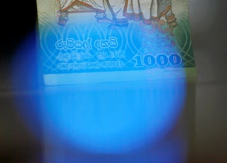 A Sri Lankan Thousand rupee note is seen in this picture illustration