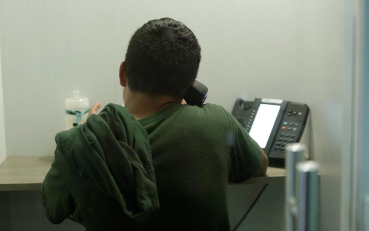 An occupant at Casa Padre, an immigrant shelter for unaccompanied minors, in Brownsville, Texas. Another shelter - Carrizo Springs - is being reopened - REUTERS