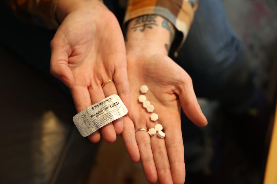 An abortion-rights advocate holds abortion pills. A recent study published in the JAMA network shows that a rise in purchasing abortion medication by women requesting advance provision.