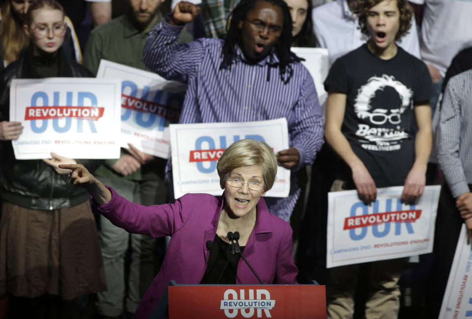 Sen. Elizabeth Warren, D-Mass., speaks during a rally Friday, March 31, 2017, in Boston. Sen. Bernie Sanders, I-Vt., and Warren made a joint appearance at the evening rally in Boston as liberals continue to mobilize against the agenda of Republican President Donald Trump. (AP Photo/Steven Senne)