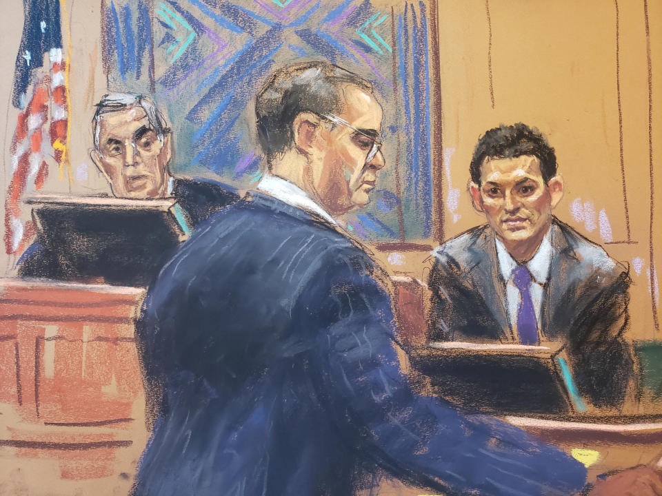 FTX founder Sam Bankman-Fried is questioned by his defense lawyer Mark Cohen as he testifies in his fraud trial over the collapse of the bankrupt cryptocurrency exchange, at federal court in New York City, U.S., October 26, 2023 in this courtroom sketch. REUTERS/Jane Rosenberg