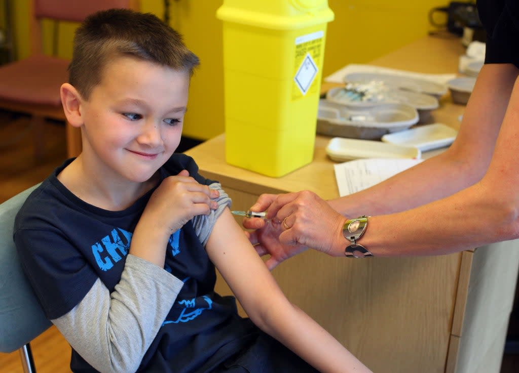 A boy receives the MMR jab at an drop-in clinic in Swansea  (AFP via Getty Images)