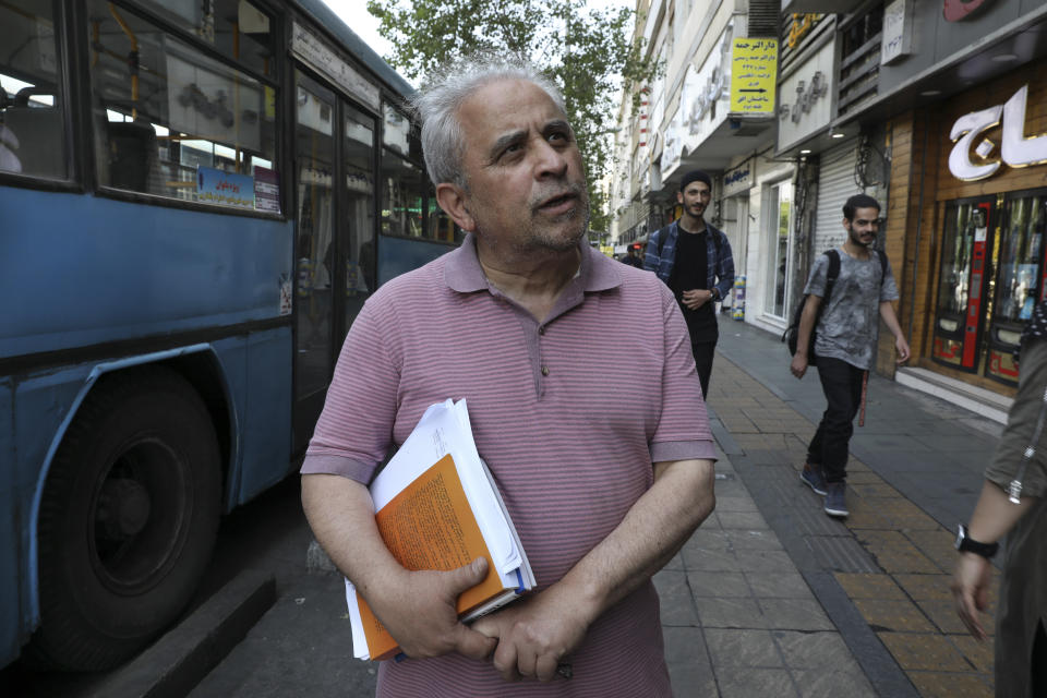 In this Friday, May 17, 2019 photo, retired accountant Sores Maleki speaks during an interview in downtown Tehran, Iran. He said talks with the U.S. to loosen sanctions would help jumpstart Iran’s economy. "We should go and talk to America with courage and strength. We are able to do that, others have done it. ... We can make concessions and win concessions. We have no other choice." (AP Photo/Vahid Salemi)