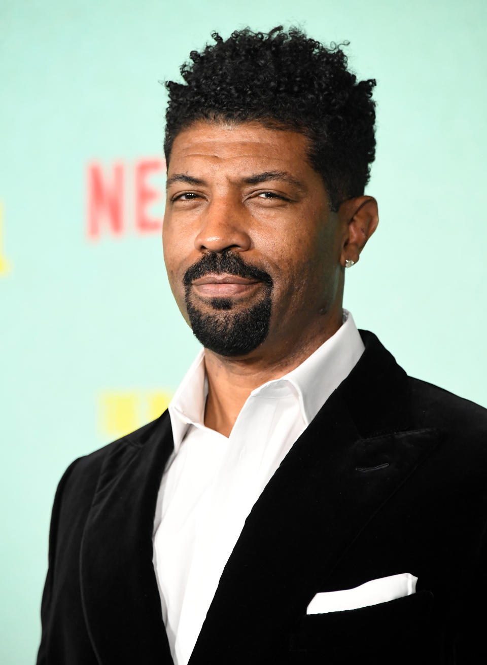 In Deon Cole’s Reel Talk interview with BET in March 2021, he shares he is a quiet person, which throws some people off because they expect him to be a loud, in-your-face comic. As a child, Cole was very imaginative. “No father figure. Just me and my mother and my mother trying to make enough for us to eat. It was just me and my imagination.”  He also says a $50 bet led to his comedy career when his friend dared him to go onstage and perform stand-up. His picks for the greatest comedians of his life that have affected him: Richard Pryor, Lenny Bruce, Eddie Murphy, Red Foxx, George Carlin, Bernie Mac. 