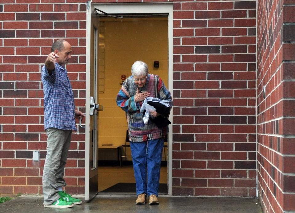 Roman Catholic Sister Megan Rice, right, was among a group of peace activists who got past G4S security guards to stage a protest in a secure area of the Y-12 nuclear weapons plant in Tennessee in 2012. Here, Rice is shown leaving a detention facility after her arrest for the break-in.