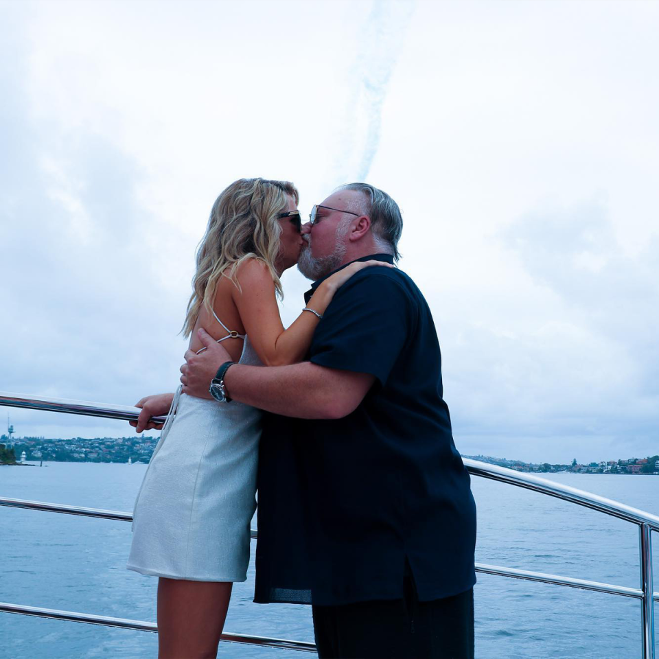 Kyle Sandilands kissing his fiancée Tegan Kynaston.