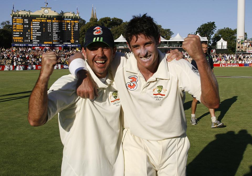 Australia’s Mitchell Johnson celebrates with captain Ricky Ponting (Photo by Gareth Copley – PA Images/PA Images via Getty Images)