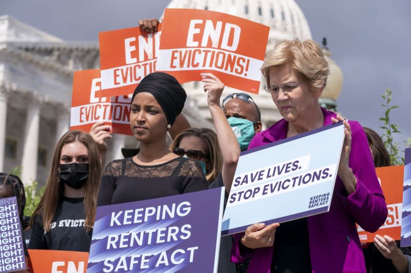 U.S. Rep. Ilhan Omar (C), D-Minn., and Sen. Elizabeth Warren (R), D-Mass. and Rep. Alexandria Ocasio-Cortez (L), D-N.Y. at a news conference in Washington, D.C. in September 2021. All three legislators are calling for the proposed merger of Discover and Capital One to be blocked. File Photo by Ken Cedeno/UPI