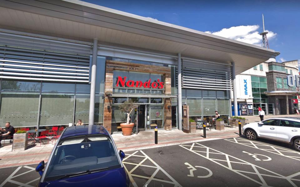 A Google Streetview image of a Nando's in a retail park