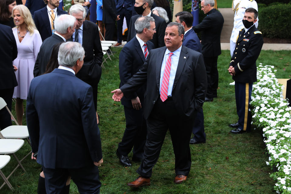 Former New Jersey Gov. Chris Christie (center) talks with guests in the Rose Garden after President Donald Trump introduced 7th U.S. Circuit Court Judge Amy Coney Barrett, 48, as his nominee to the Supreme Court at the White House on Sept. 26. (Photo: Chip Somodevilla via Getty Images)