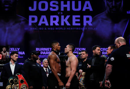 Boxing - Anthony Joshua & Joseph Parker Weigh-In - Motorpoint Arena, Cardiff, Britain - March 30, 2018 Anthony Joshua and Joseph Parker go head to head during the weigh in Action Images via Reuters/Andrew Couldridge