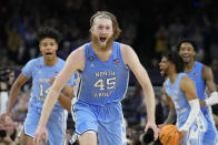 North Carolina's Brady Manek (45) celebrates after beating Duke in a college basketball game during the semifinal round of the Men's Final Four NCAA tournament, Saturday, April 2, 2022, in New Orleans. (AP Photo/David J. Phillip)