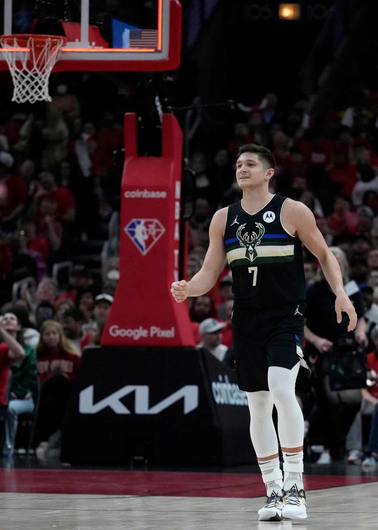 Milwaukee Bucks guard Grayson Allen (7) celebrates a basket just before the buzzer at the end of the 3rd period during the second half of the Bucks 119-95 win at the United Center in Chicago on Sunday, April 24, 2022. 