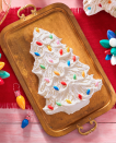 <p>Reminiscent of old-fashioned frosted Christmas trees, this beautiful cakes makes good use of a shaped cake pan and a <a href="https://www.amazon.com/Christmas-Cavity-Silicone-Baking-Chocolate/dp/B081D9HLVH/?tag=syn-yahoo-20&ascsubtag=%5Bartid%7C10050.g.531%5Bsrc%7Cyahoo-us" rel="nofollow noopener" target="_blank" data-ylk="slk:light-bulb-shaped silicone mold;elm:context_link;itc:0;sec:content-canvas" class="link ">light-bulb-shaped silicone mold</a>.</p><p><strong><a href="https://www.countryliving.com/food-drinks/a29629010/retro-christmas-tree-cake-recipe/" rel="nofollow noopener" target="_blank" data-ylk="slk:Get the recipe.;elm:context_link;itc:0;sec:content-canvas" class="link ">Get the recipe.</a></strong></p><p><strong><a class="link " href="https://www.amazon.com/Wilton-2105-0070-Christmas-Tree-Cake/dp/B00KKV15X0/?tag=syn-yahoo-20&ascsubtag=%5Bartid%7C10050.g.531%5Bsrc%7Cyahoo-us" rel="nofollow noopener" target="_blank" data-ylk="slk:SHOP CHRISTMAS TREE CAKE PANS;elm:context_link;itc:0;sec:content-canvas">SHOP CHRISTMAS TREE CAKE PANS</a><br></strong></p>