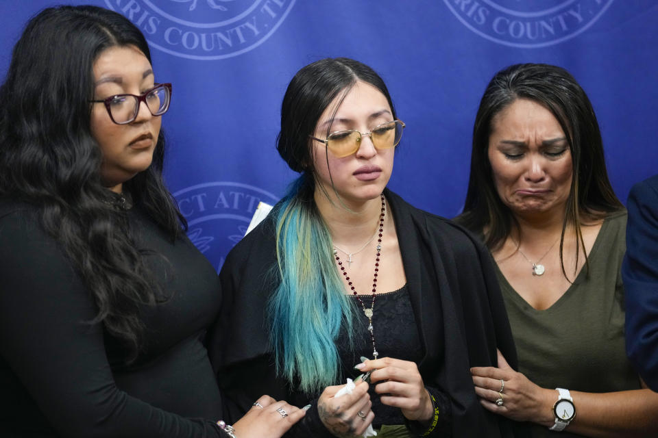 Alexis Nungaray, the mother of Jocelyn Nungaray, center, is embraced by Tiffany Carmona, left, and Jackie Major after speaking about her daughter during a news conference after Franklin Peña, one of the two men accused of killing the 12-year-old girl, appeared in court, Monday, June 24, 2024, in Houston. Peña was ordered held on $10 million bail as he and another man, Johan Jose Rangel-Martinez, are charged with capital murder over the girl's death. (Brett Coomer/Houston Chronicle via AP)