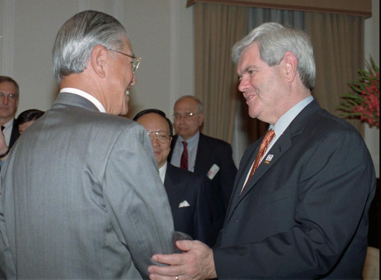 FILE - U.S. House Speaker Newt Gingrich, right, speaks with Taiwanese President Lee Teng-hui at a meeting in Lee's office in Taipei Wednesday, April 2, 1997. 