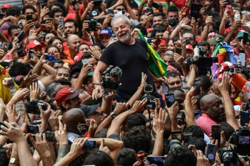 Brazil's former president Luiz Inacio Lula da Silva is carried on the shoulders of supporters outside the metalworkers' union building in Sao Bernardo do Campo, Brazil, on November 9, 2019