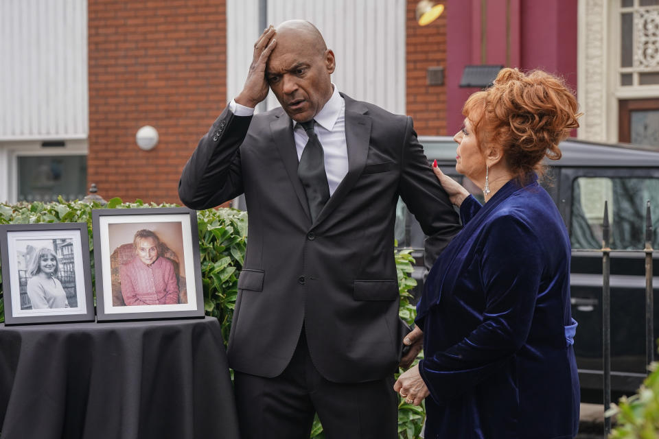 A concerned Elaine Peacock puts her hand on George Knight's shoulder as he has a dizzy spill.