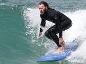 <p>Joel Edgerton hits the waves at Bondi Beach in Sydney, Australia on Tuesday. </p>