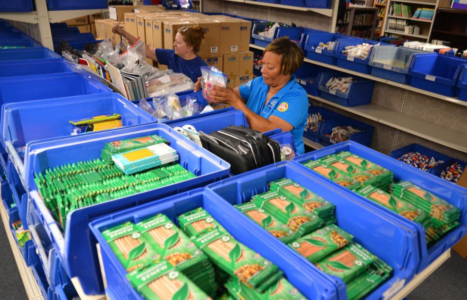 Dana Morgan and Pam Lyons organize supplies for back to school. Collected and donated school supplies are stacking up at the Brevard Schools Foundation Supply Zone in Cocoa. Packing day, when supplies will be put in backpacks for students, is July 22 in the cafeteria at the Clearlake location from 9-1 p.m.