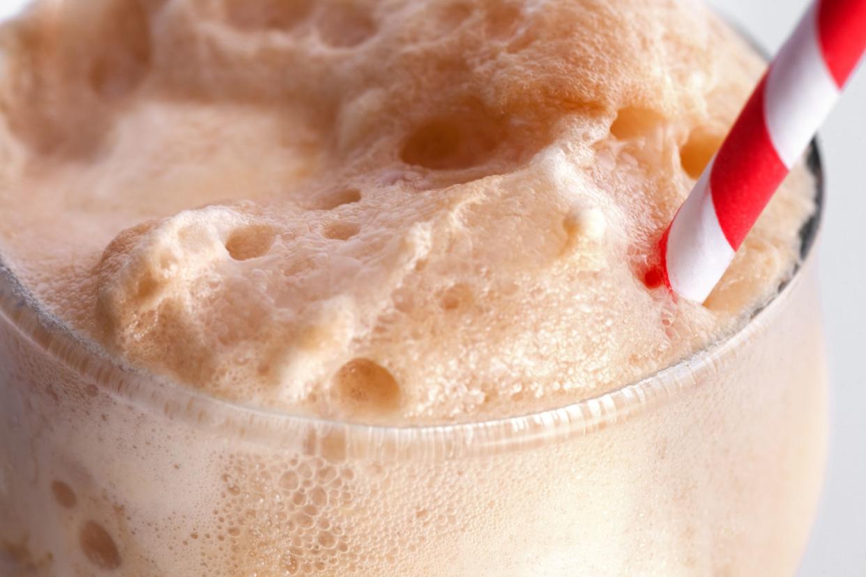 Close up of the foam on a root beer float