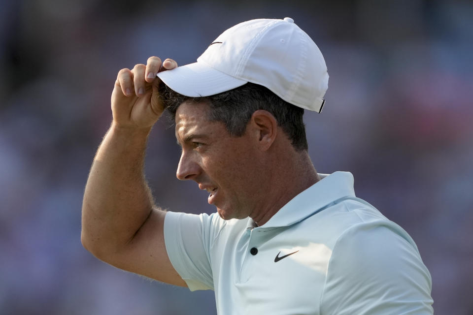 Rory McIlroy, of Northern Ireland, reacts after missing a putt on the 18th hole during the final round of the U.S. Open golf tournament Sunday, June 16, 2024, in Pinehurst, N.C. (AP Photo/Matt York)