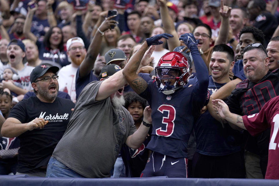 Houston Texans wide receiver Tank Dell (3) celebrates with fans after catching a touchdown pass in the first half of an NFL football game against the Arizona Cardinals in Houston, Sunday, Nov. 19, 2023. (AP Photo/Eric Christian Smith)