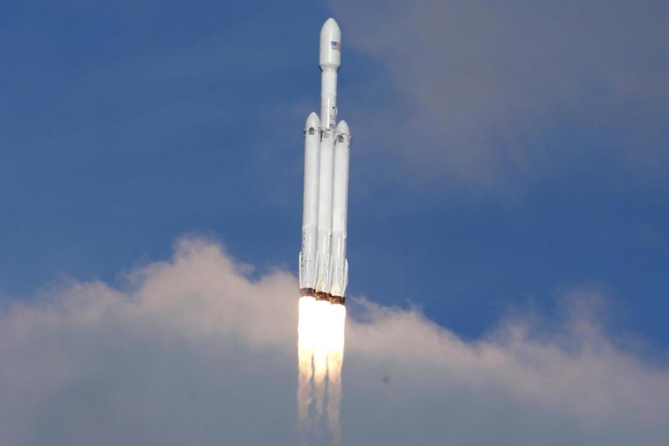 Elon Musk's Falcon Heavy rocket launches off (Reuters)