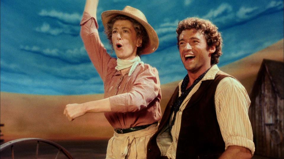 Maureen Lipman, left, as Aunt Eller, and Hugh Jackman as Curly in a scene from the National Theatre’s 1998 production of “Oklahoma!”