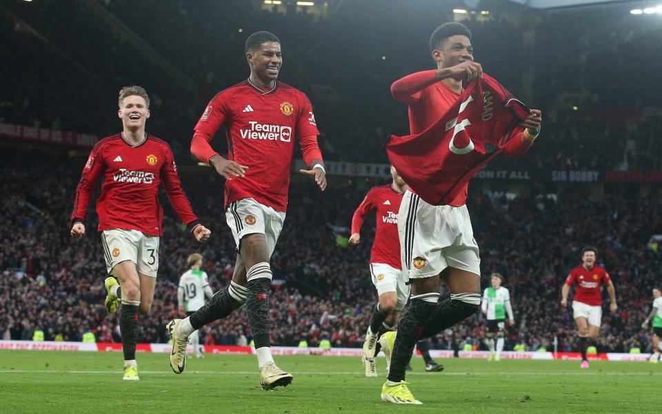 Amad of Manchester United celebrates scoring their fourth goal during the Emirates FA Cup quarter-final against Liverpool at Old Trafford