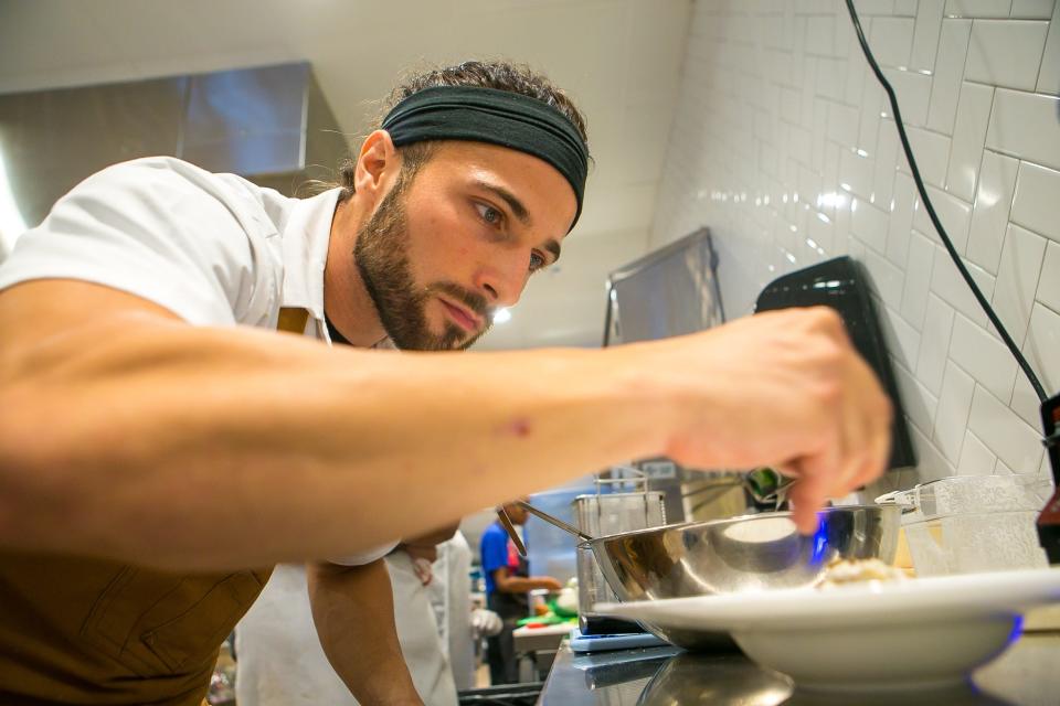 Chef Antimo DiMeo plates a Cacio e Pepe dish, a classic Roman dish of cheese and pepper at Bardea Italian restaurant on North Market Street in downtown Wilmington.