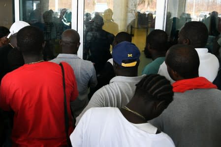 Residents wait at the airport in hopes of evacuating the island in the wake of Hurricane Dorian in Marsh Harbour