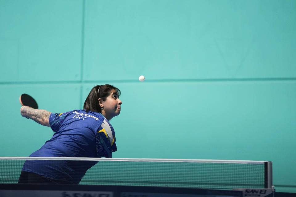 Brazil's Bruna Alexandre trains during the Pan American Games in Santiago, Chile, Sunday, Oct. 29, 2023. Alexandre is a top five Paralympic table tennis players in the world, but nearing the 220th place in the Olympic rankings, which she started taking part of in January. She hopes to be among the 80 best to qualify for the Paris Games. (AP Photo/Matias Delacroix)