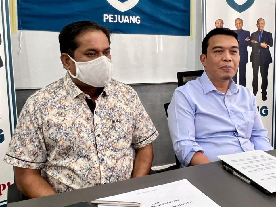 Johor’s Pejuang deputy chief Nornekman Osman (right) speaks to the media at the party’s state office in Johor Baru January 27, 2022. — Picture by Ben Tan