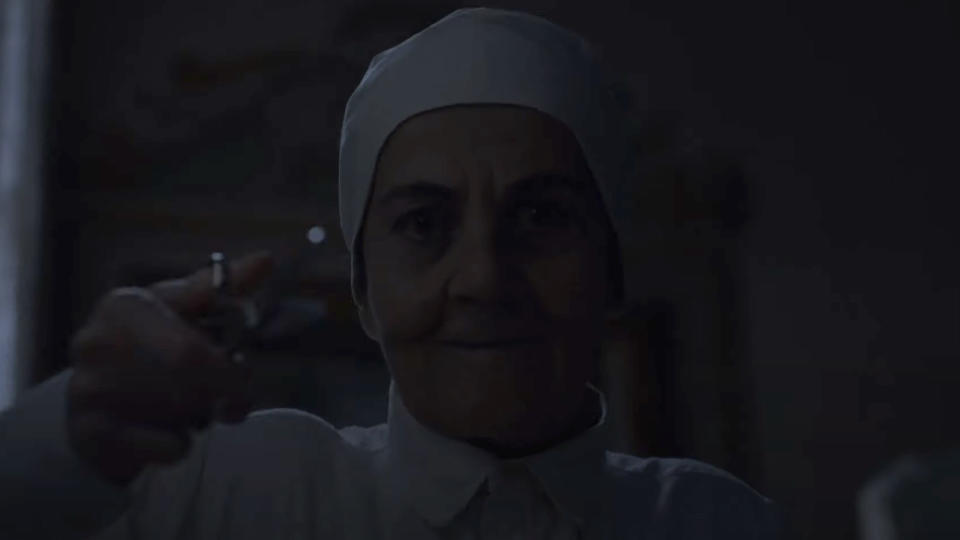 Nun holding scissors in Immaculate