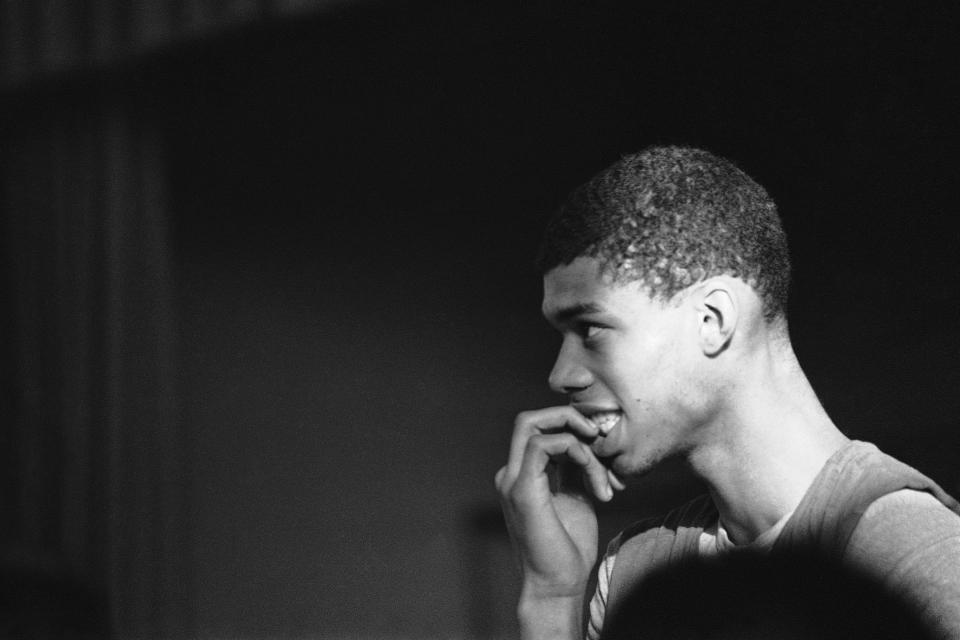 FILE - In this Feb. 17, 1965, file photo, Power Memorial High School basketball player Lew Alcindor practices in New York. Alcindor, later Kareem Abdul-Jabbar, spent about 15 minutes walking through an exhibit at the Museum of the City of New York about some of New York's greatest basketball players and moments, which opens to the public Friday. Besides the video, there was also a photo of him playing in high school. He quickly pointed out former Knicks' great Dean Meminger in the picture as well. (AP Photo/File)