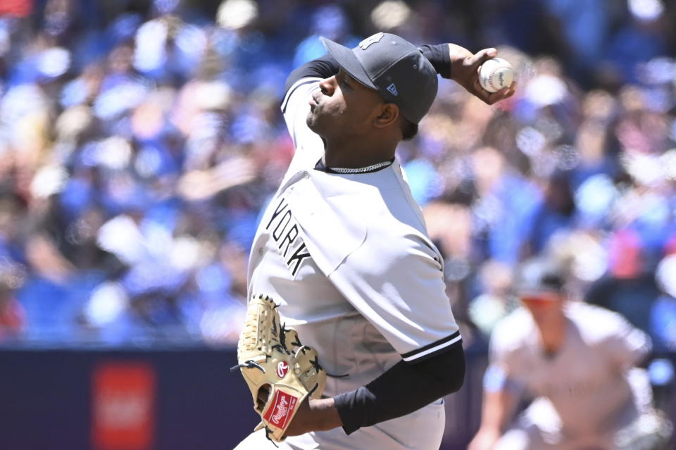 New York Yankees starting pitcher Luis Severino throws to a Toronto Blue Jays batter in first-inning baseball game action in Toronto, Sunday, June 19, 2022. (Jon Blacker/The Canadian Press via AP)
