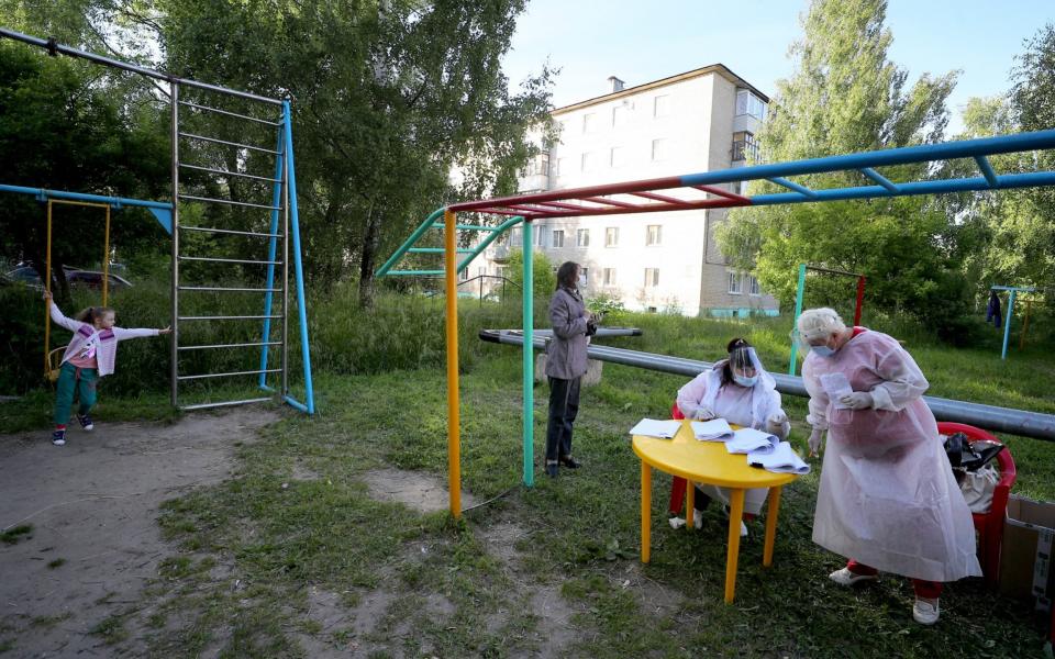 Many polling stations outside Moscow were working in outdoor settings - Vladimir Smirnov/Tass via Getty Images