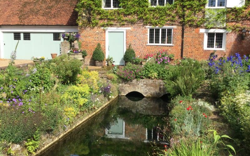 Mill House with its original mill stream benefit from the River Misbourne flowing through - National Garden Scheme