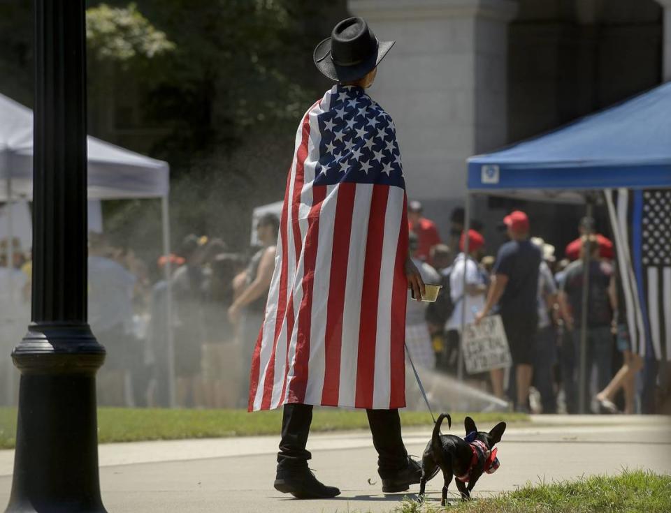 Take your dog for a patriotic walk early before the temperature rises or the fireworks go off.