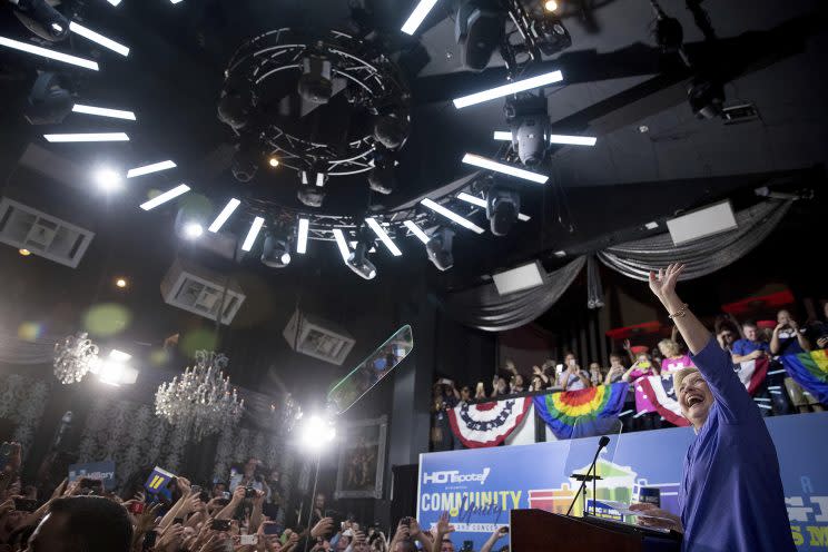 Hillary Clinton takes the stage to speak at a rally and concert in Wilton Manors, Fla., Oct. 30, 2016. 