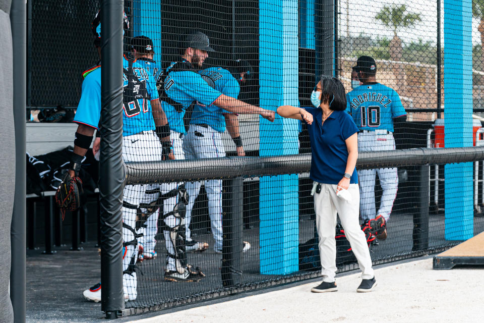 Ng greets Miami Marlins prospect Cameron Barstad on Feb. 18, the opening day of spring training, in Jupiter, Fla.<span class="copyright">Miami Marlins</span>