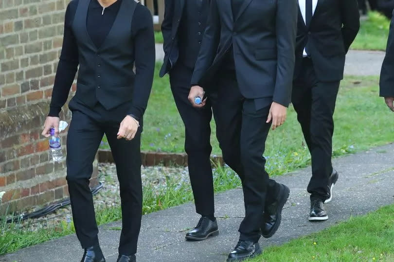 The Wanted members carried Tom's coffin into the church