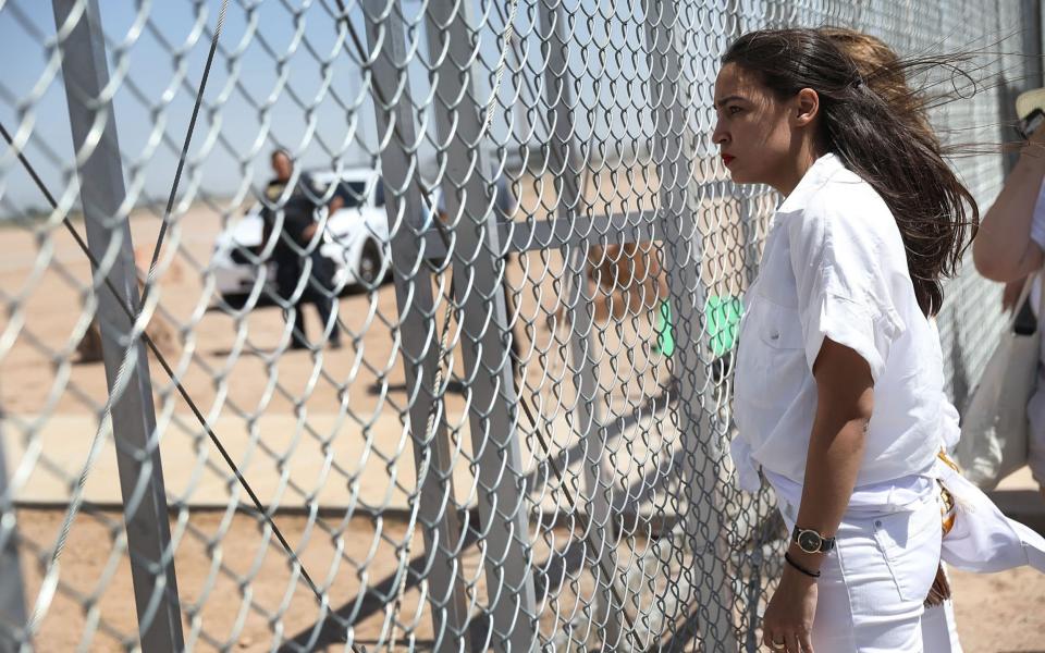 Alexandria Ocasio-Cortez protesting the separation of children from their parents last week - Getty Images North America