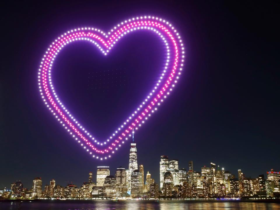 A heart is created by 500 drones over the skyline on November 3, 2022.