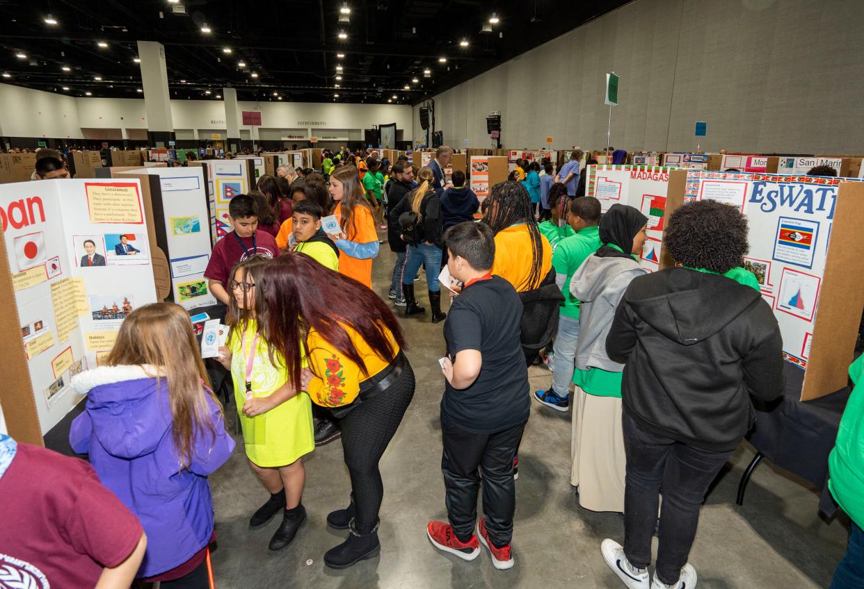 Students participate in the Milwaukee Public Schools World Fair, a gathering of 2,400 students speaking 35 languages on Thursday at the Baird Center in Milwaukee. It's the ninth year of the event.