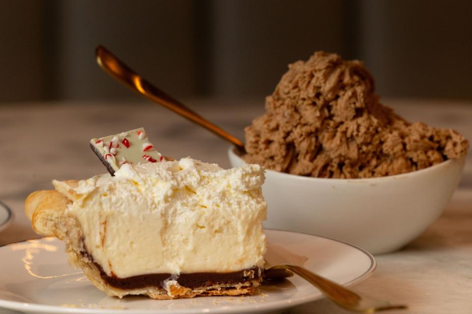 A peppermint pie from Grapefruit & Thyme and a bowl of Eleanor’s Coconut Cream are plated for a photo at The Dessert Collective in American Fork on Tuesday, Jan. 2, 2024. | Megan Nielsen, Deseret News