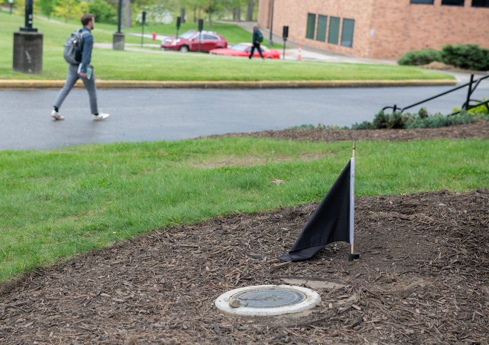 A marker next to Taylor Hall at Kent State University shows were Alan Canfora was wounded by an Ohio National Guardsman on May 4, 1970.