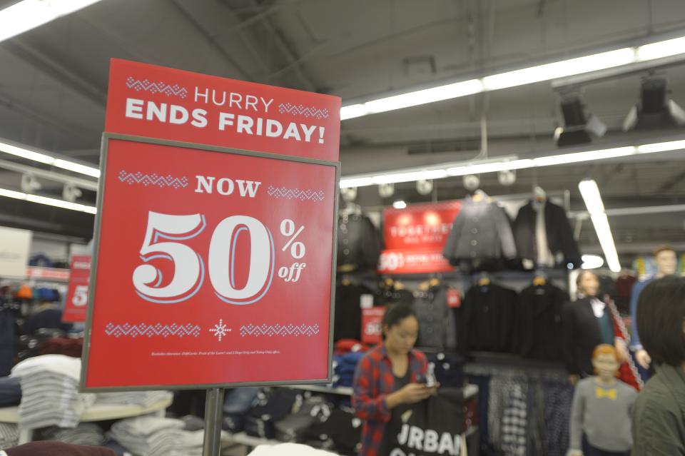 Sale signs at Old Navy on Friday morning at the Irvine Spectrum on November 28, 2014 (Photo by Jeff Gritchen/Digital First Media/Orange County Register via Getty Images)