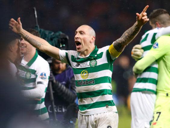 Celtic captain Scott Brown celebrates (PA)